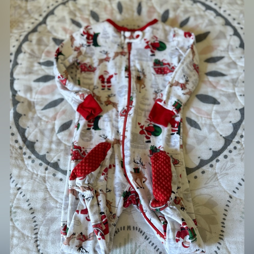The Children’s Place Christmas Footie pajamas. Size 6-9 months.